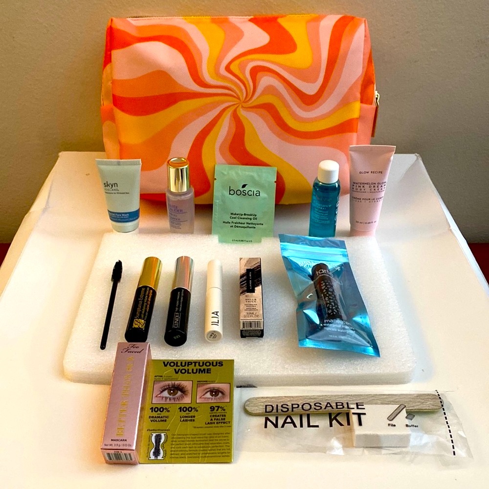 New NIB 6 trial size mascaras and makeup removers. With top zip pouch